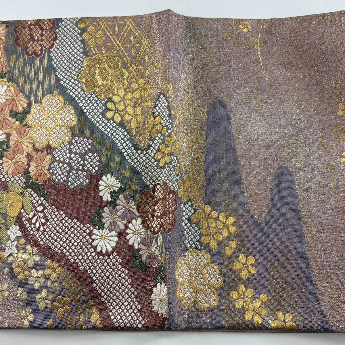 美品】 袋帯 秀品 御所車 草花 金糸 箔 薄紫 お太鼓柄 正絹｜中古