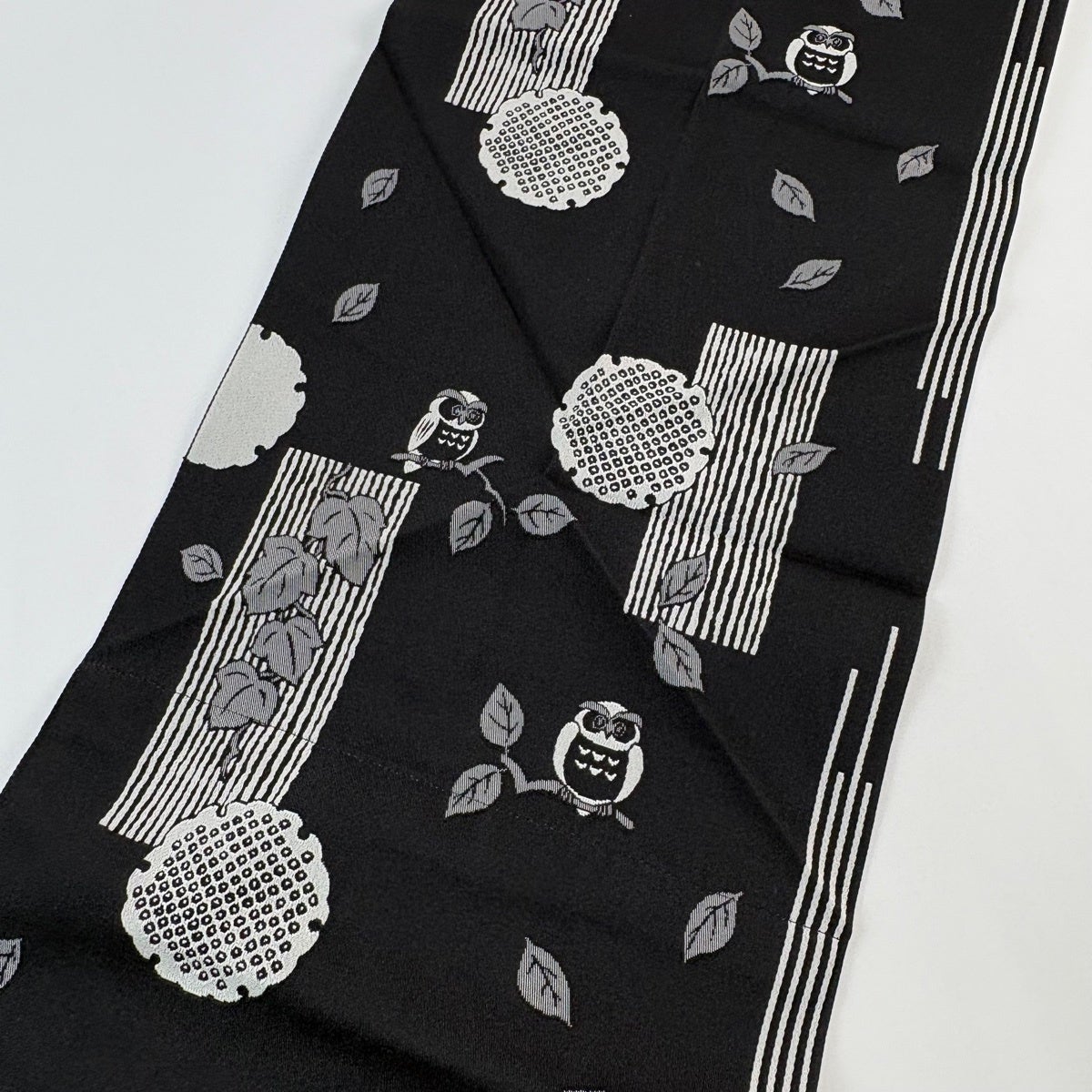 名古屋帯 名品 八寸名古屋帯 松葉仕立て ふくろう 雪輪 黒 正絹｜中古