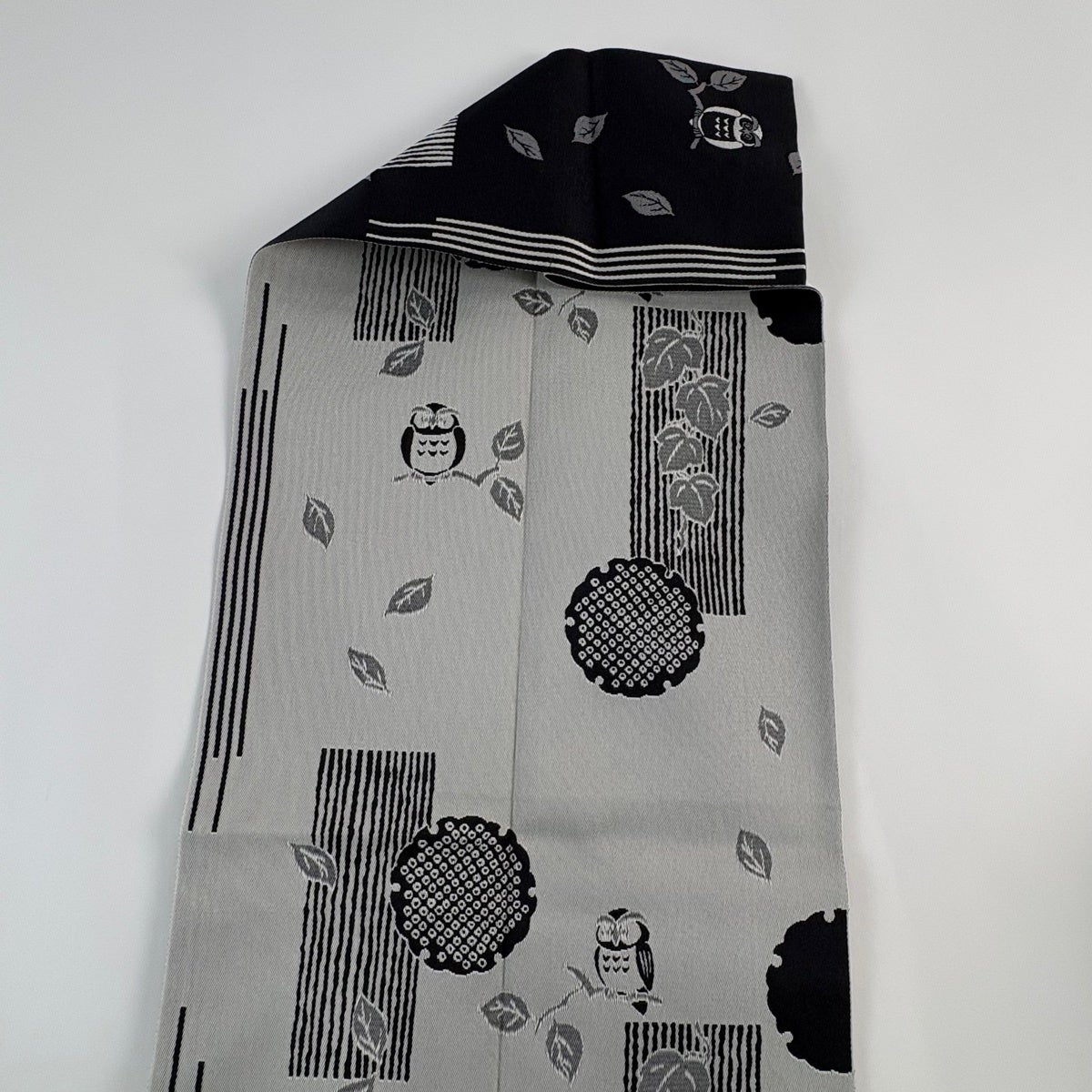 名古屋帯 名品 八寸名古屋帯 松葉仕立て ふくろう 雪輪 黒 正絹｜中古