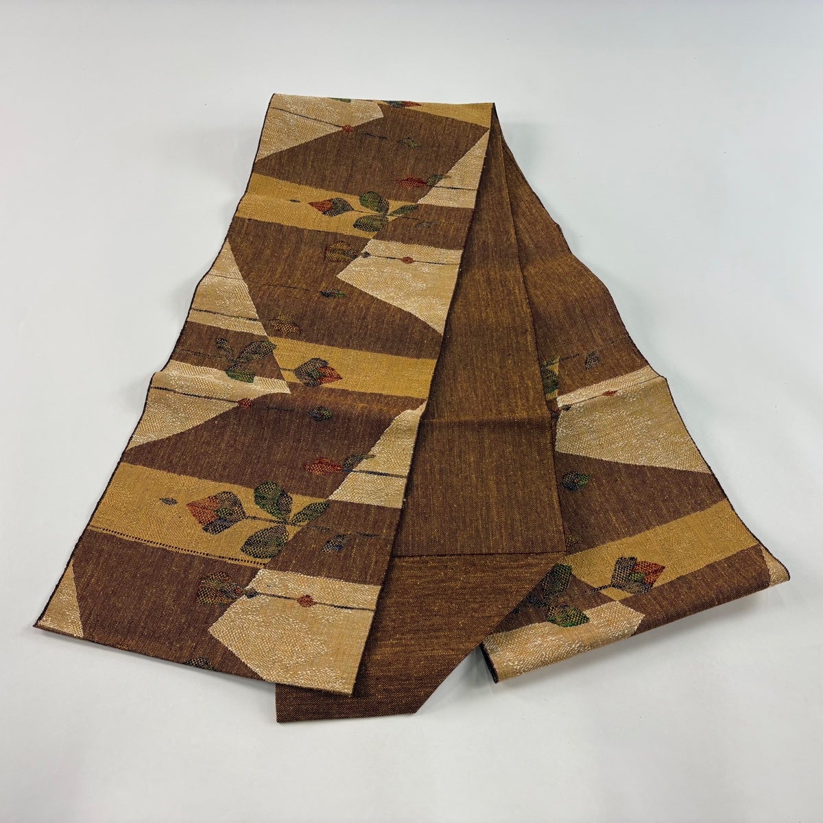 美品】 名古屋帯 秀品 八寸名古屋帯 松葉仕立て 草花 幾何学模様 茶色