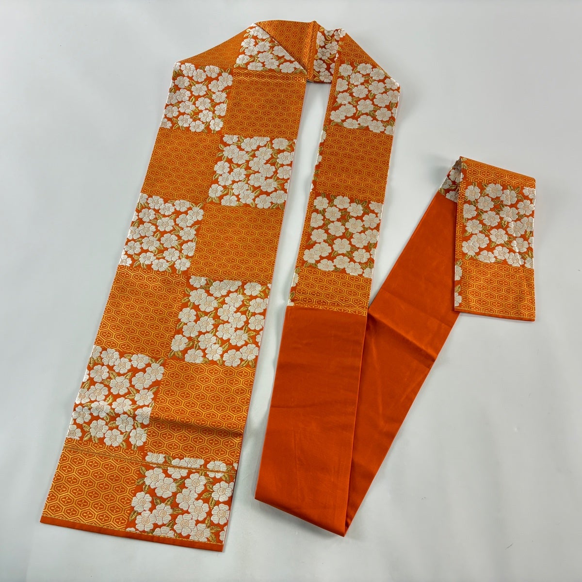 美品】 名古屋帯 優品 手先長尺 関西仕立て 桜 亀甲 唐織 箔 オレンジ