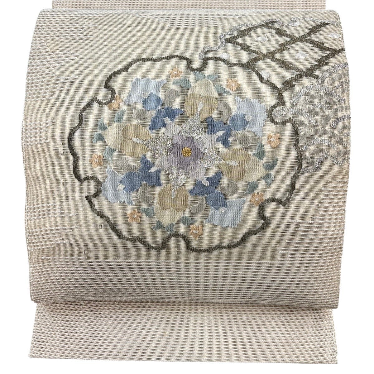 【未使用品】袋帯 睡蓮　部分刺繍　油絵のような繊細な織物　キラキラ水色　お太鼓柄 袋帯 秀品 夏帯 絽 雪輪 華文 金銀糸 ベージュ お太鼓柄 正絹｜中古