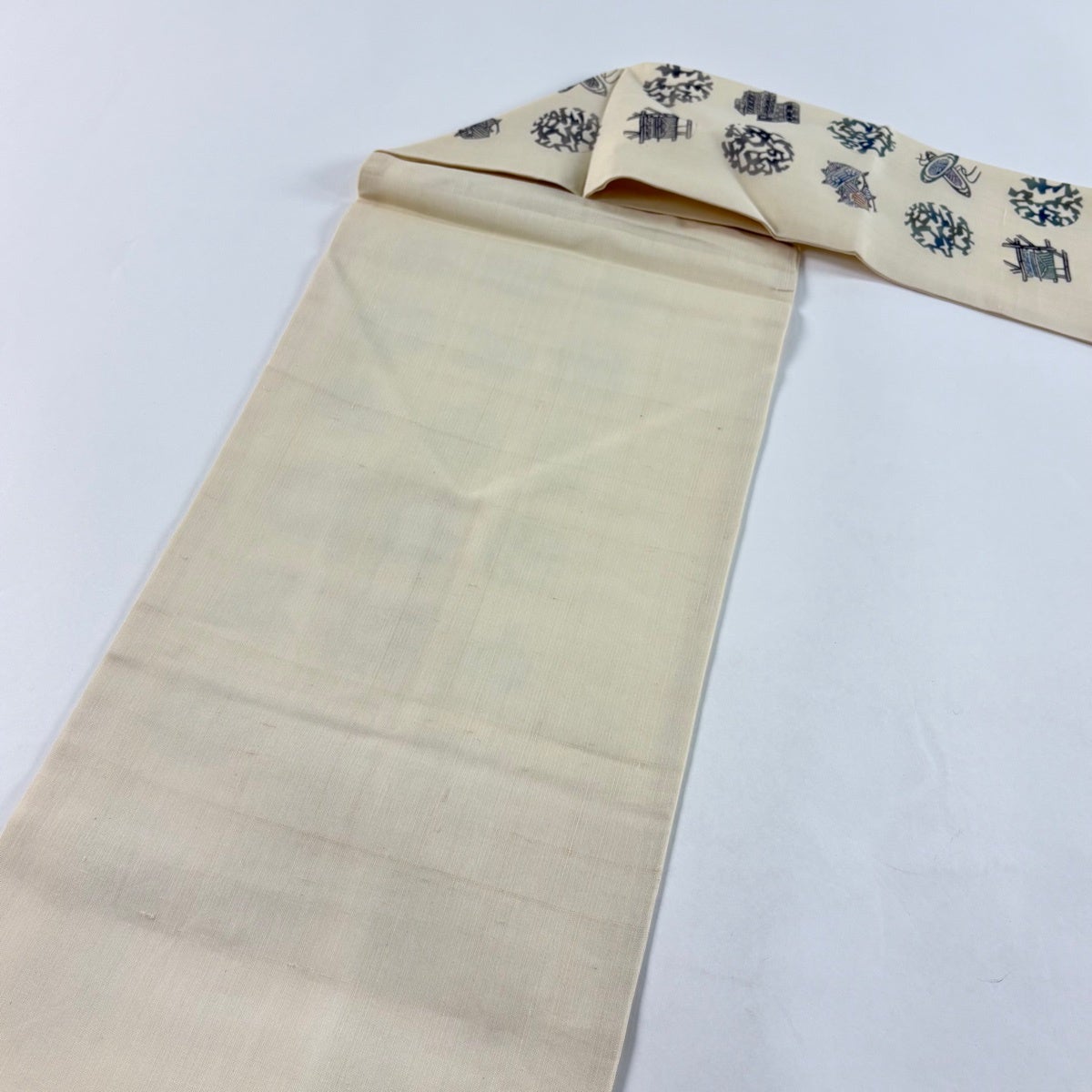 名古屋帯 名品 落款あり 夏帯 糸巻き 幾何学模様 クリーム 正絹｜中古