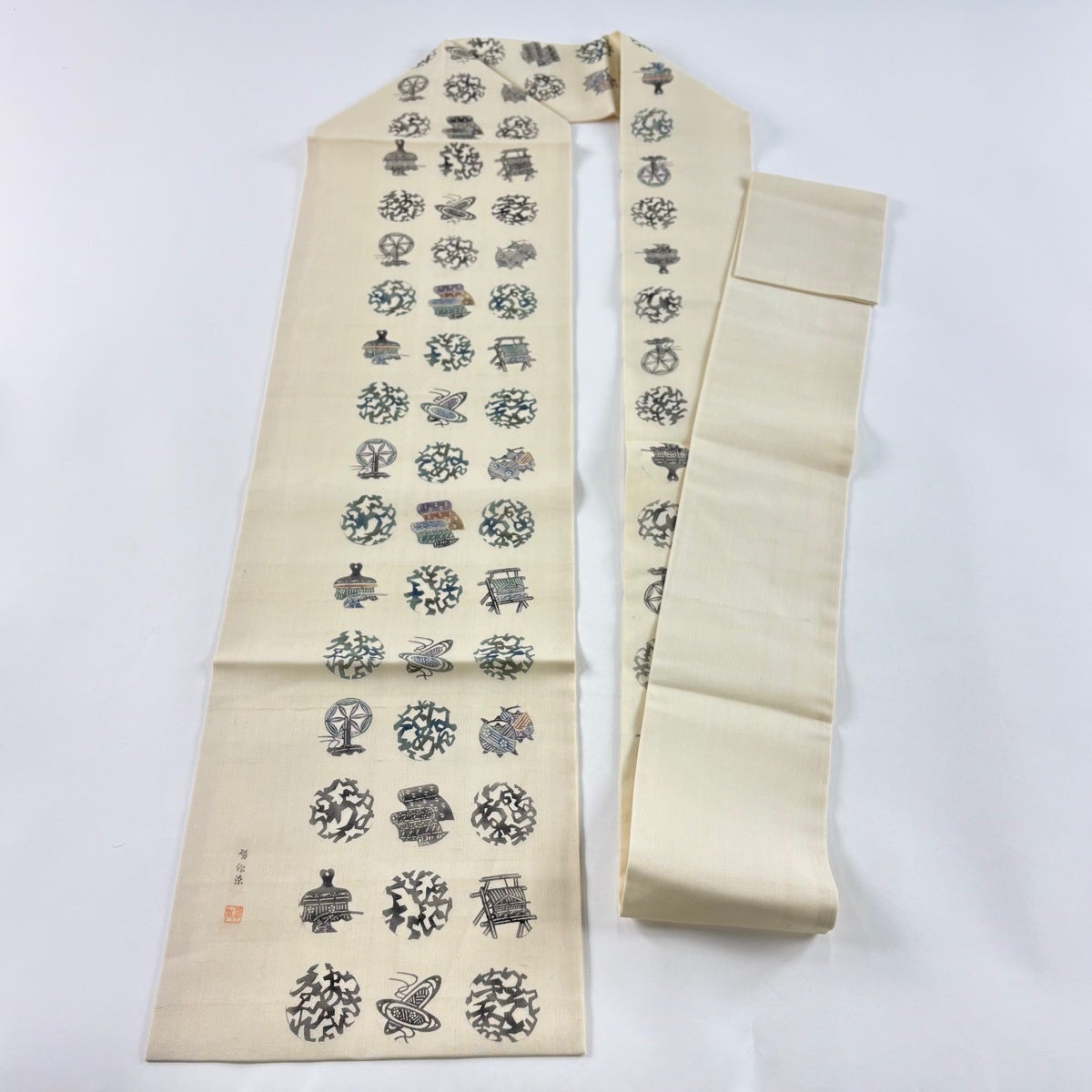 名古屋帯 名品 落款あり 夏帯 糸巻き 幾何学模様 クリーム 正絹｜中古