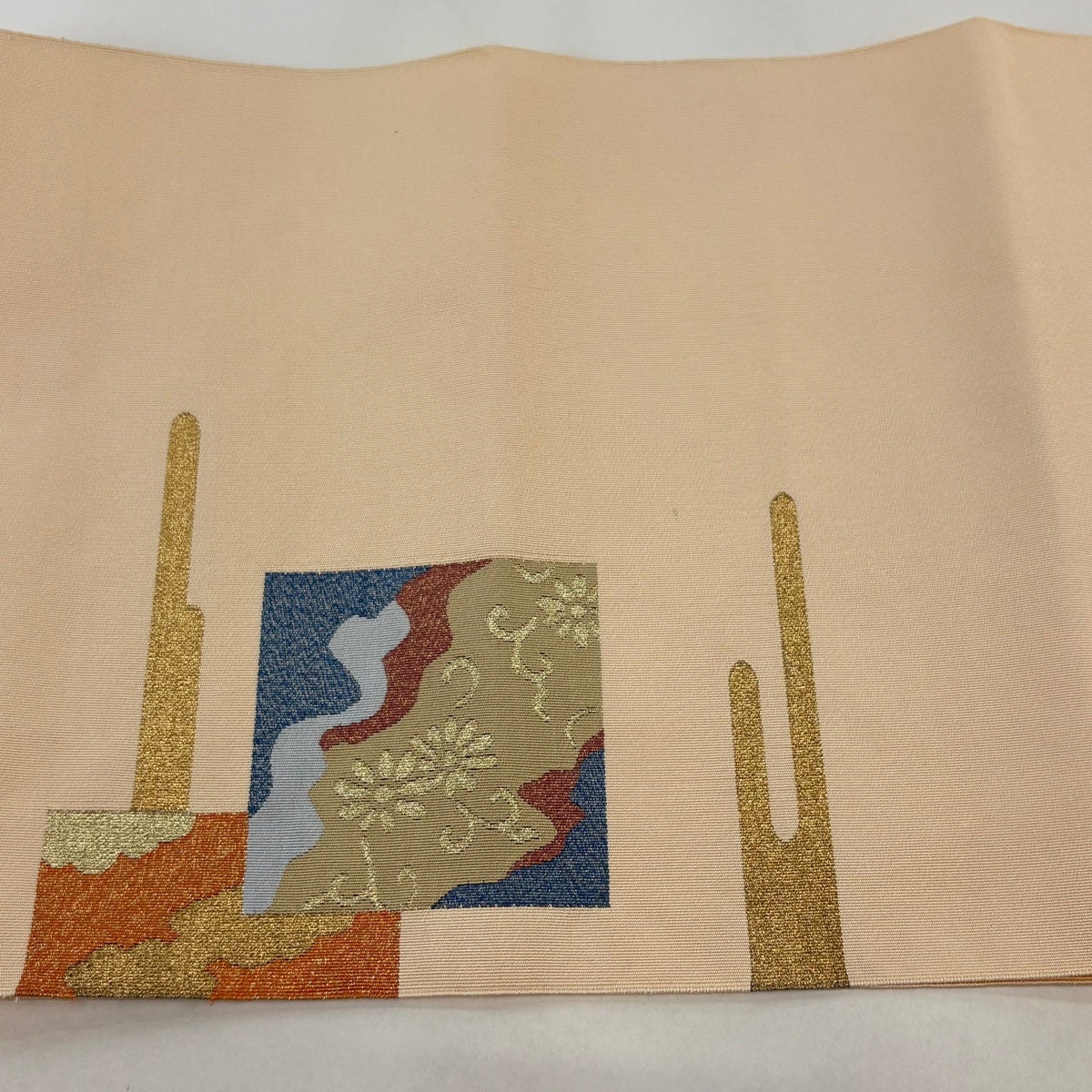 名古屋帯 優品 八寸名古屋帯 松葉仕立て 花唐草 ヱ霞 金糸 薄オレンジ