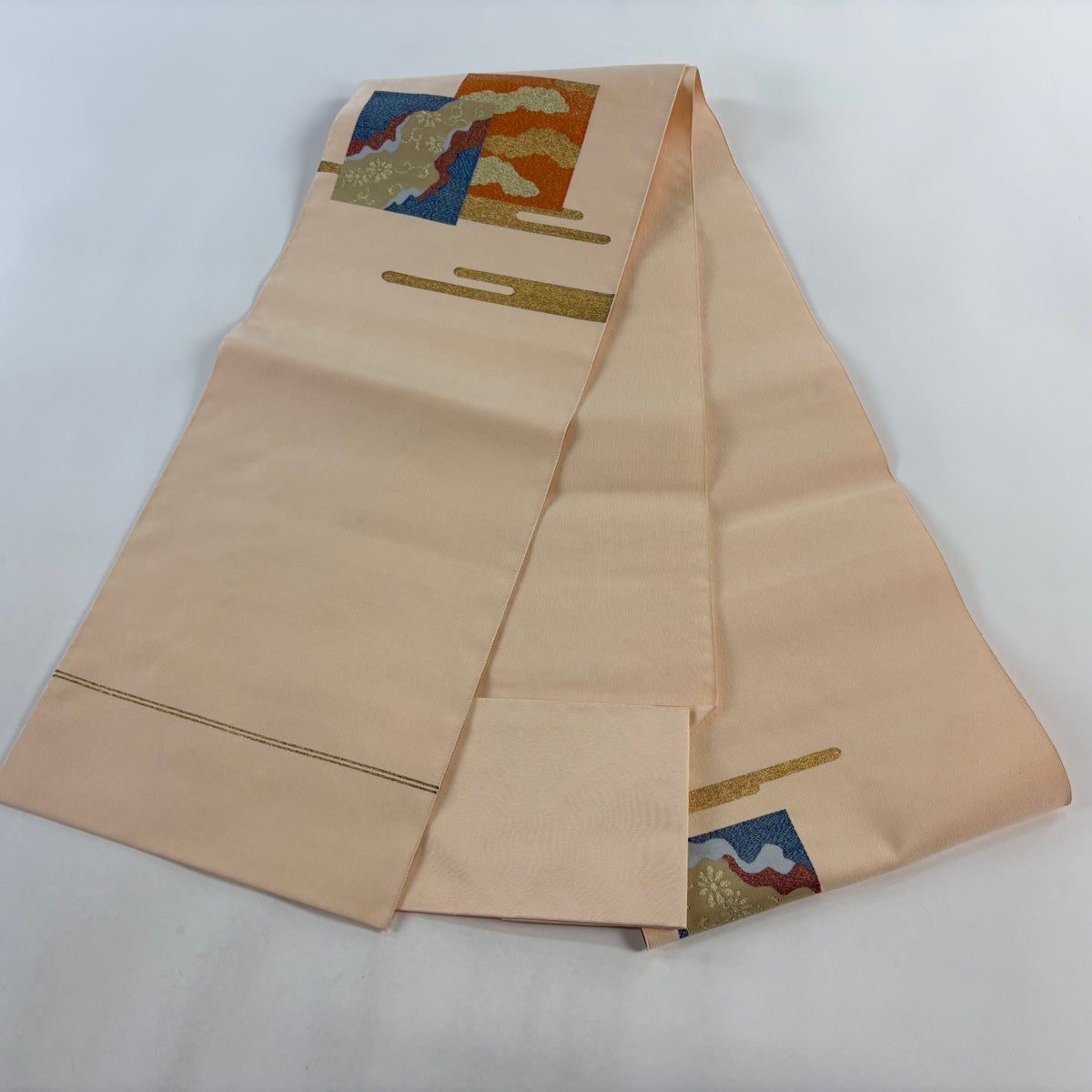 名古屋帯 優品 八寸名古屋帯 松葉仕立て 花唐草 ヱ霞 金糸 薄オレンジ