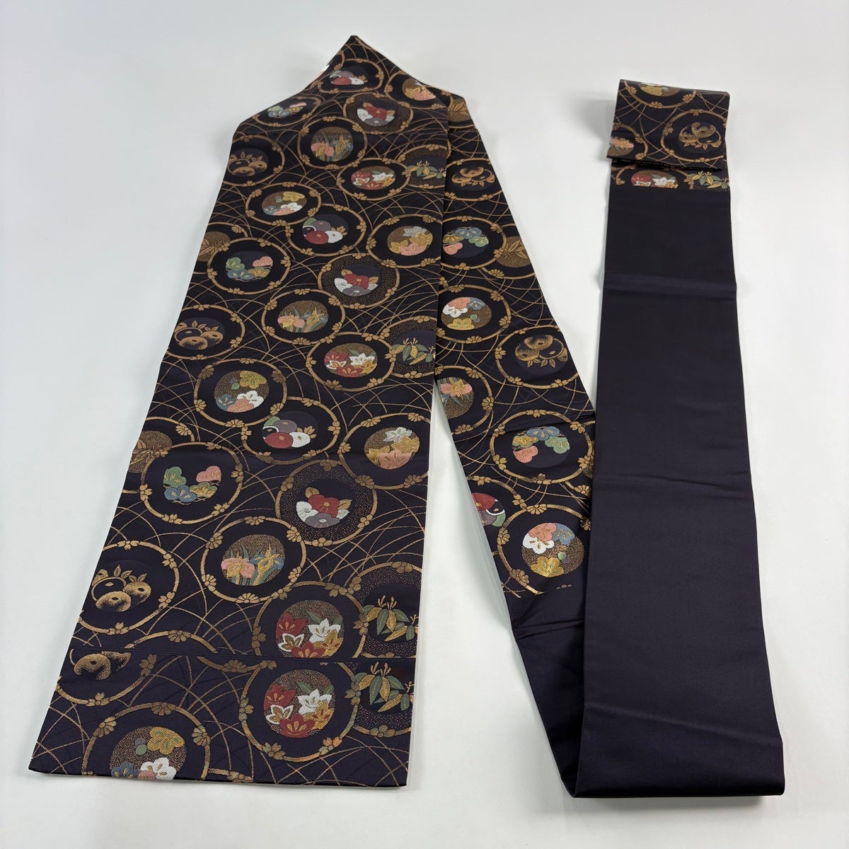 美品】 名古屋帯 優品 松竹梅 草花 金銀糸 箔 黒 正絹｜中古・古着