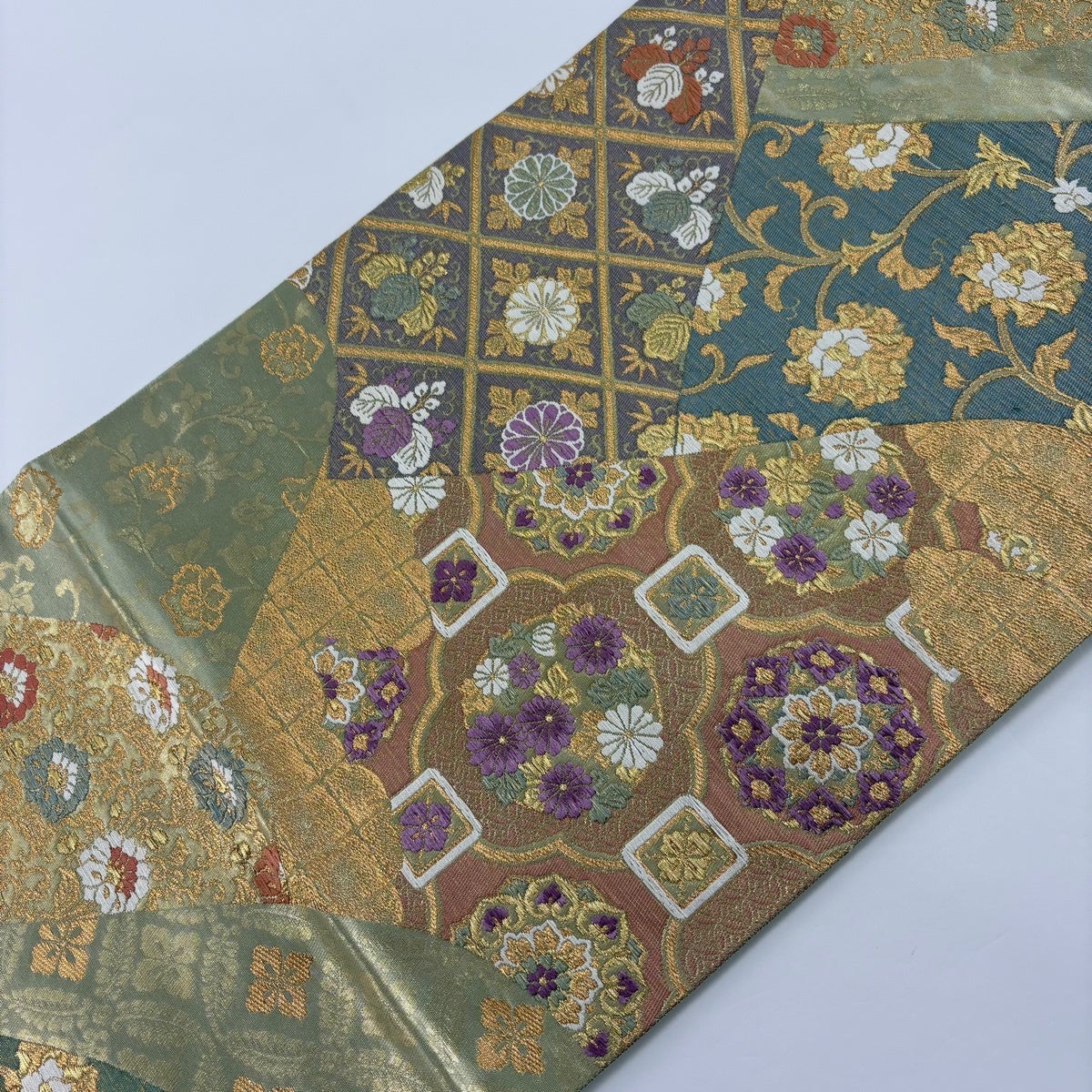 美品】 袋帯 名品 じゅらく 落款あり 春秋祥華文 草花 花唐草 唐織