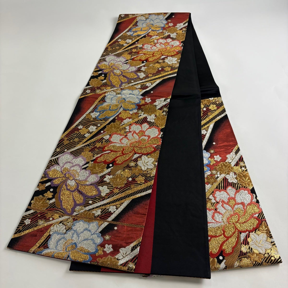 美品】 袋帯 秀品 振袖向き 彩映錦紋 金糸 箔 赤黒 六通 正絹｜中古