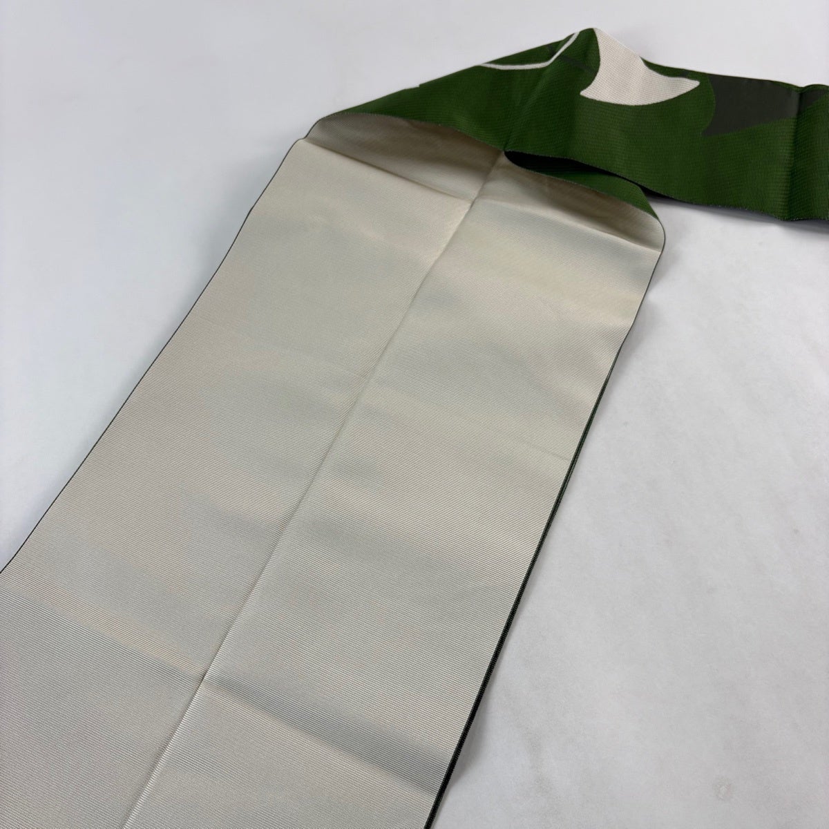 名古屋帯 逸品 八寸名古屋帯 松葉仕立て ホルン 音符 緑 正絹｜中古