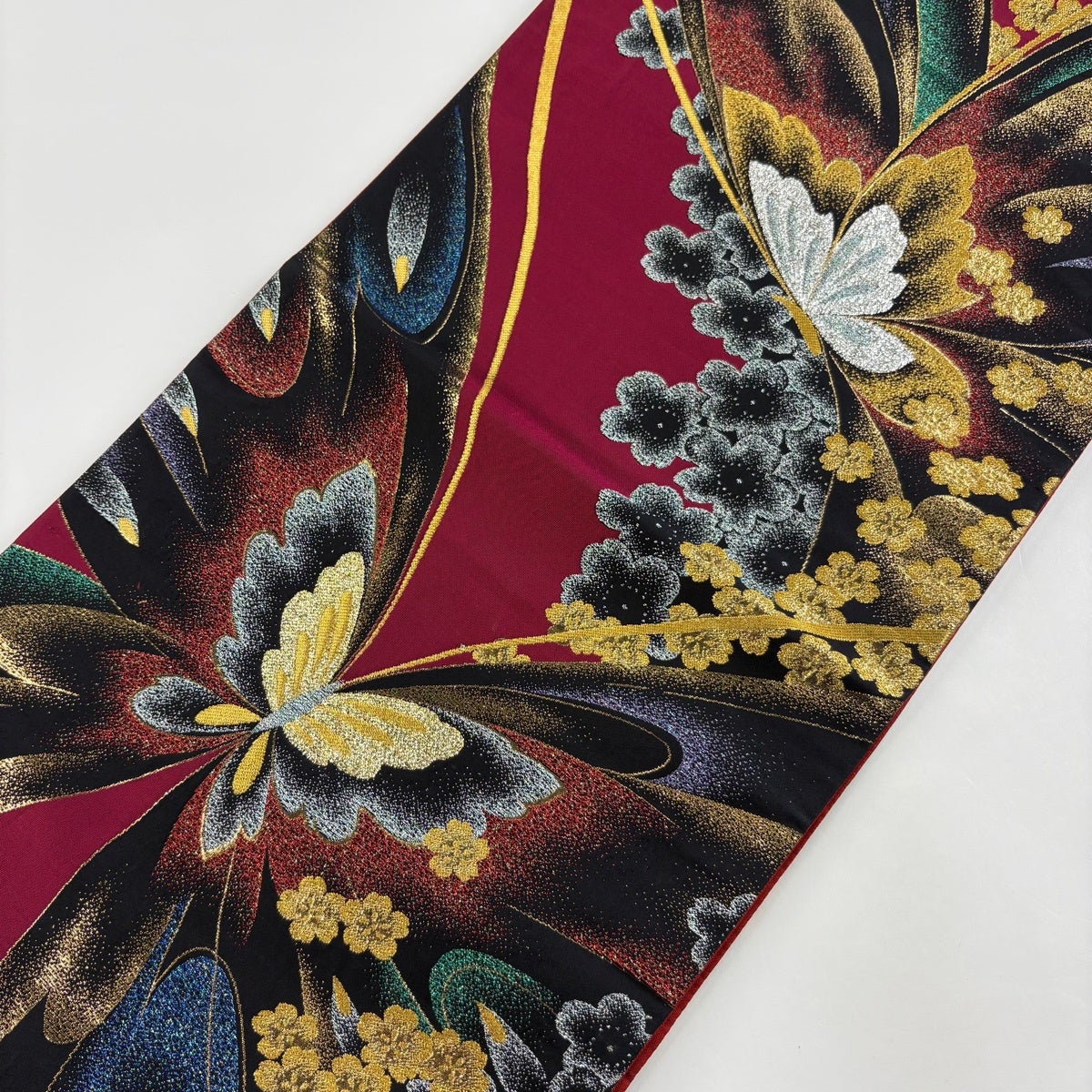 美品】 袋帯 秀品 振袖向き 蝶 桜 金糸 箔 えんじ色 六通 正絹｜中古
