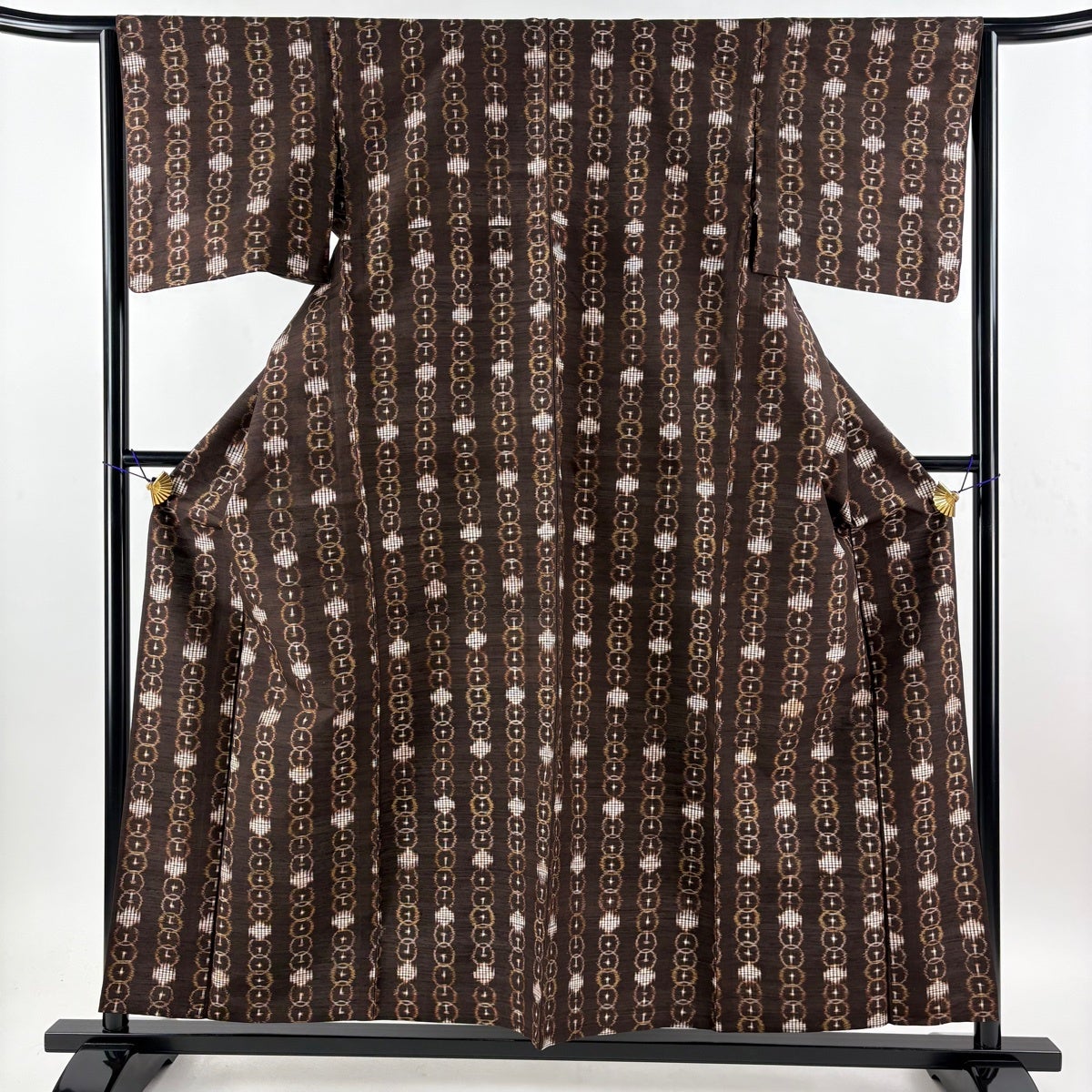 紬 身丈157cm 裄丈64cm M 袷 草花 幾何学 焦茶色 正絹 秀品｜中古