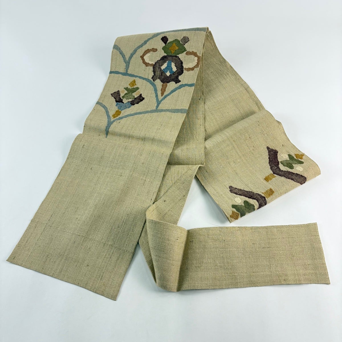 名古屋帯 秀品 松葉仕立て 八寸名古屋帯 紬地 幾何学模様 薄茶色 正絹