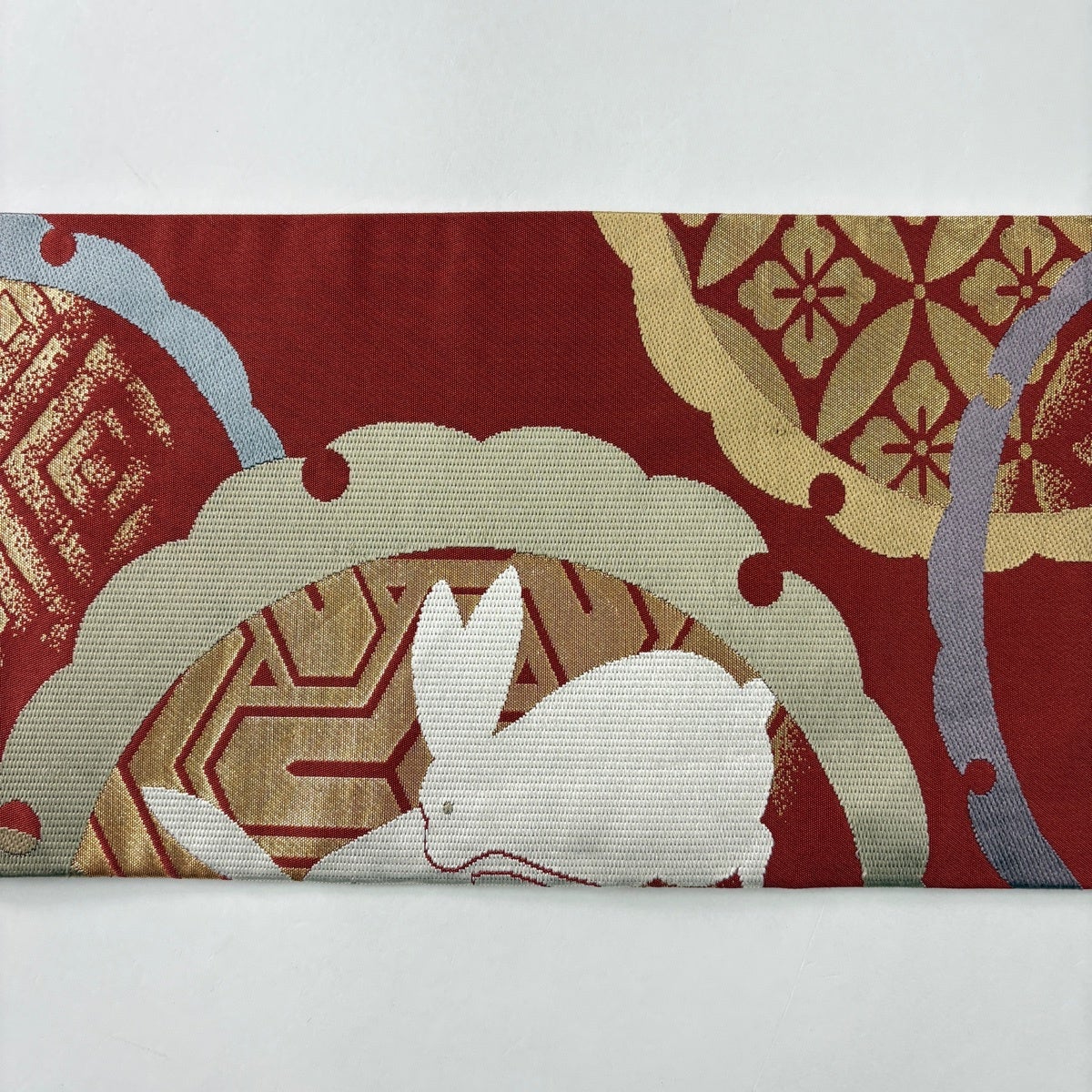 美品】 名古屋帯 名品 雪輪 うさぎ 箔 朱色 正絹｜中古・古着