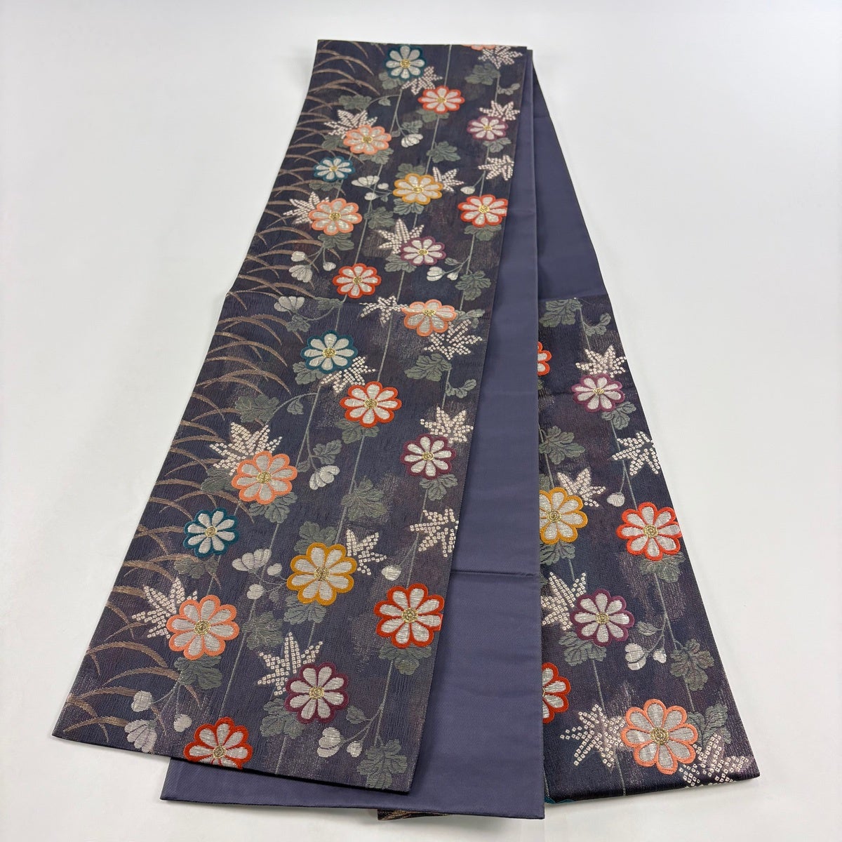 美品】 袋帯 名品 花井幸子 落款あり 草花 箔 紫 六通 正絹｜中古