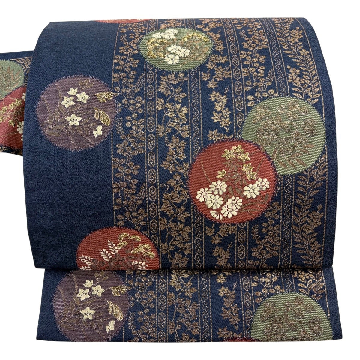 美品】 名古屋帯 優品 紬地 秋草 丸文 箔 唐織 紺色 正絹｜中古・古着