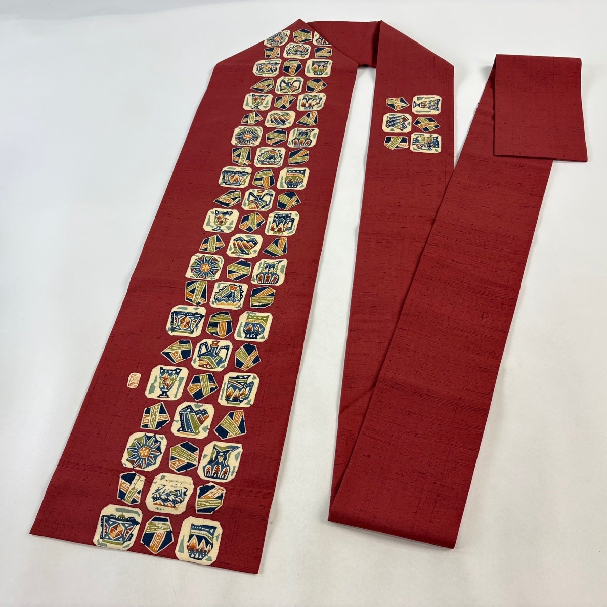 美品】 名古屋帯 秀品 落款あり 器物柄 壺 紬地 茜色 正絹｜中古・古着