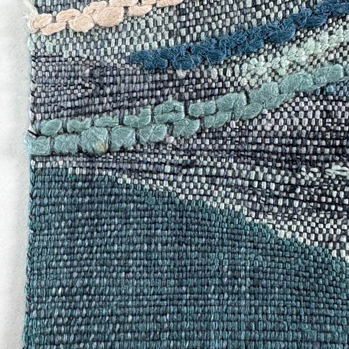 名古屋帯 秀品 松葉仕立て 八寸名古屋帯 紬地 流水 刺繍 銀糸 青緑