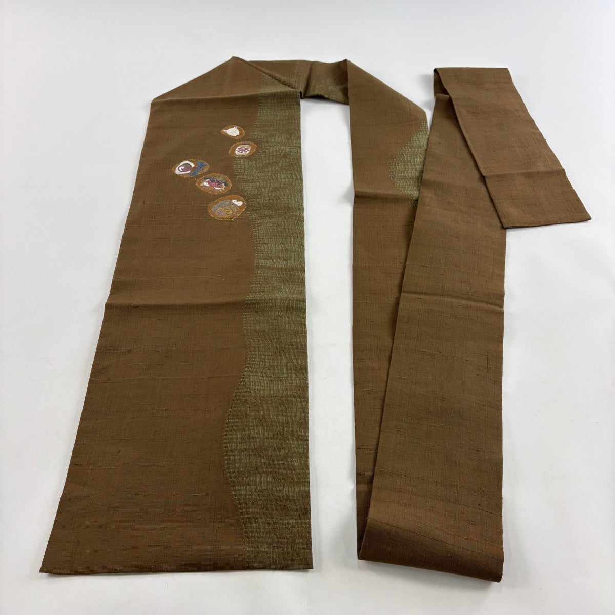 名古屋帯 名品 紬地 獅子舞 団扇 絞り 茶色 正絹｜中古・古着