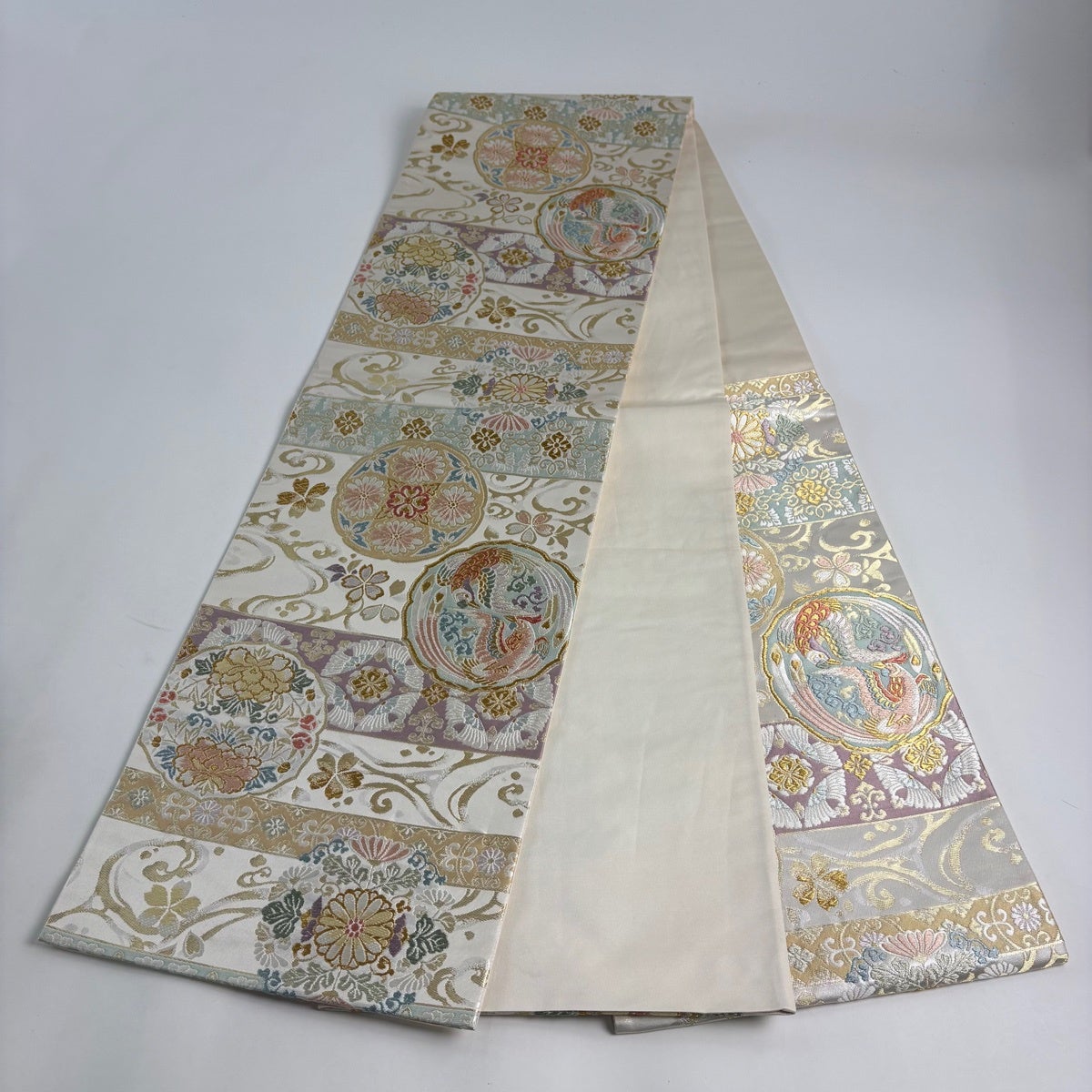 美品】 袋帯 秀品 華文 鳥丸文 金糸 唐織 クリーム 六通 正絹｜中古