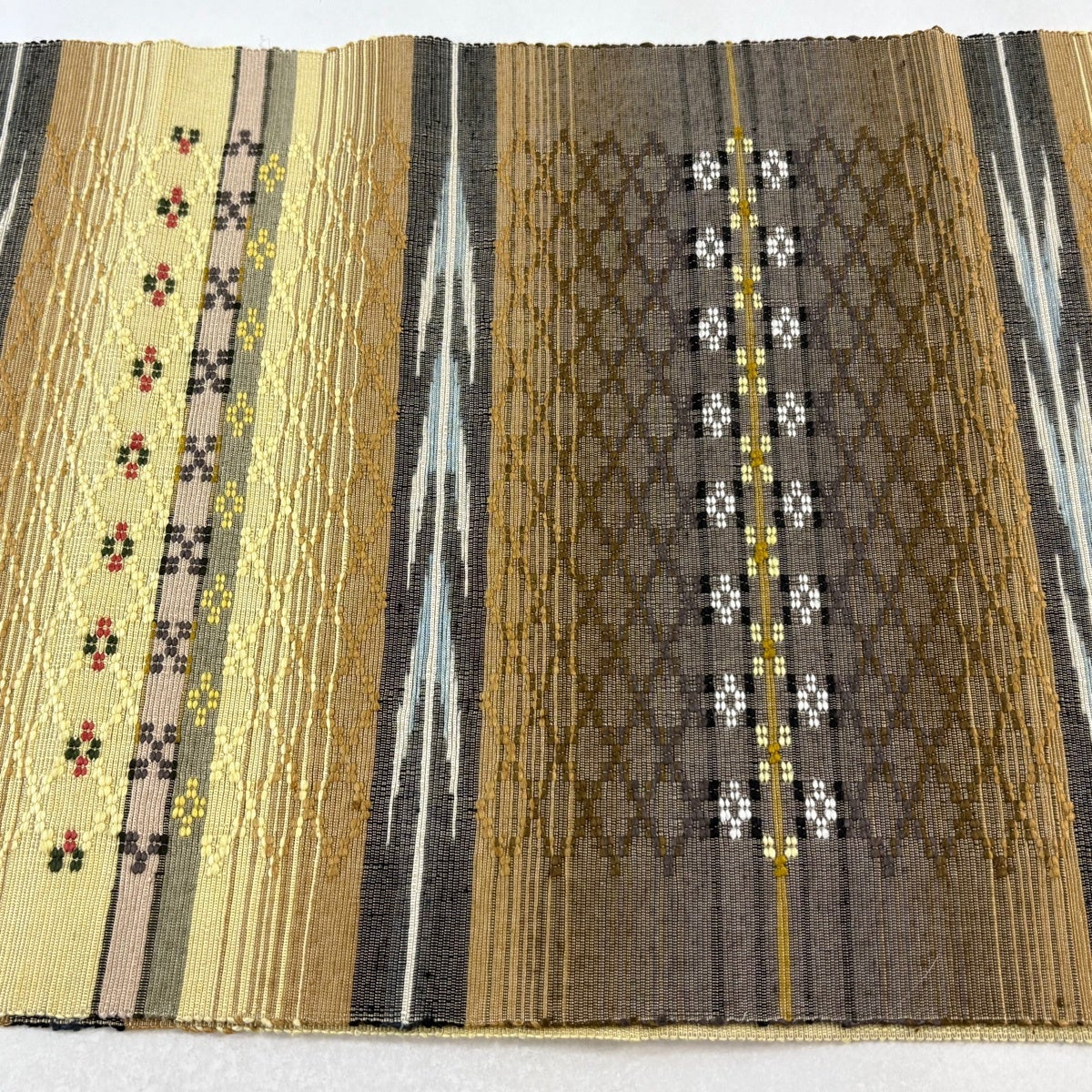 名古屋帯 逸品 八寸名古屋帯 松葉仕立て 幾何学 菱 花織 茶色 正絹