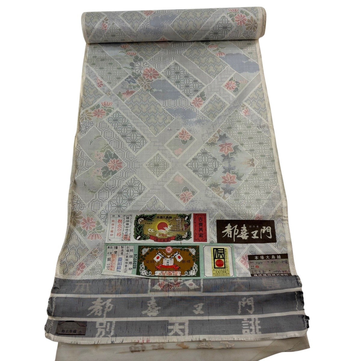 反物 逸品 大島紬 都喜ヱ門 証紙 草花 菱 灰白 正絹｜中古・古着