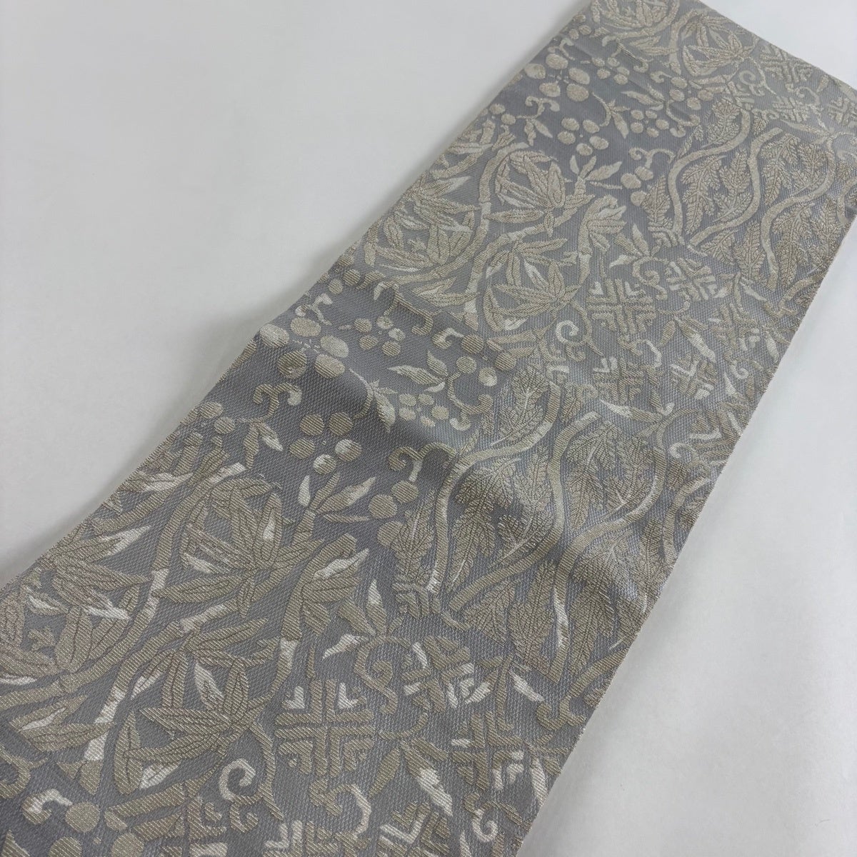 袋帯 名品 花菱 草花 銀糸 薄紫 お太鼓柄 正絹｜中古・古着