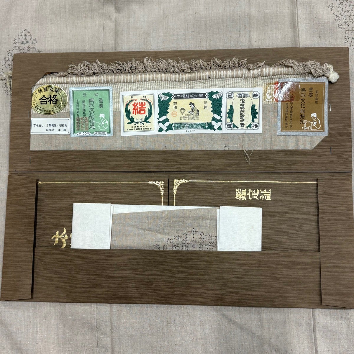 結城紬 身丈159.5cm 裄丈64cm M 袷 本場結城紬 奥順 証紙あり 亀甲絣