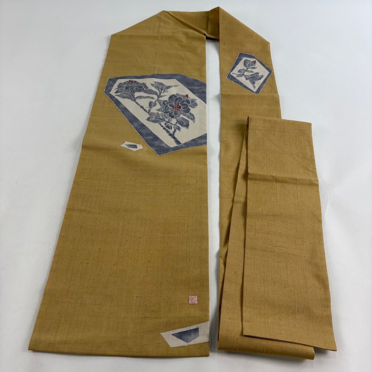 名古屋帯 秀品 落款あり 紬地 枝花 幾何学模様 薄黄土色 正絹｜中古