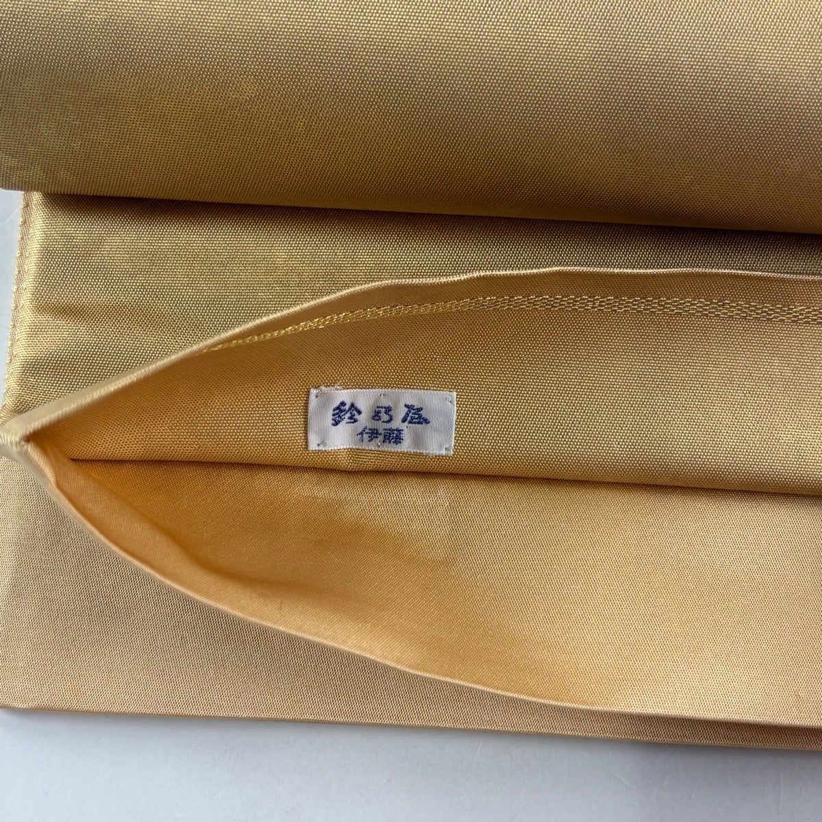 美品】 袋帯 秀品 鈴乃屋 若松 松笠 金糸 箔 金色 お太鼓柄 正絹｜中古
