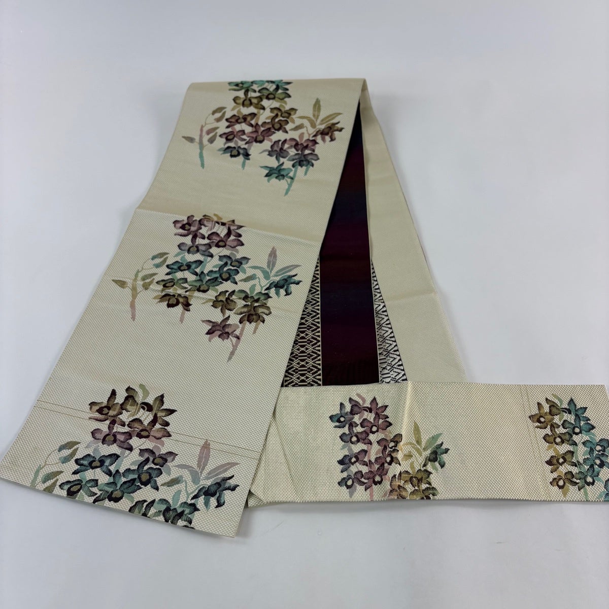 名古屋帯 秀品 八寸名古屋帯 松葉仕立て 草花 幾何学 金糸 クリーム
