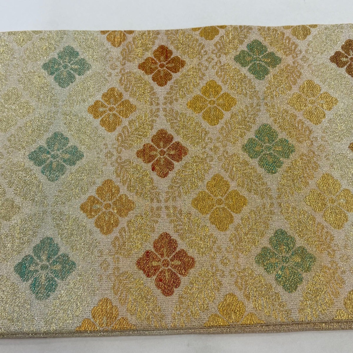 美品】 袋帯 逸品 桝屋高尾 落款あり ねん金綴錦 藤七宝花菱 金糸 箔