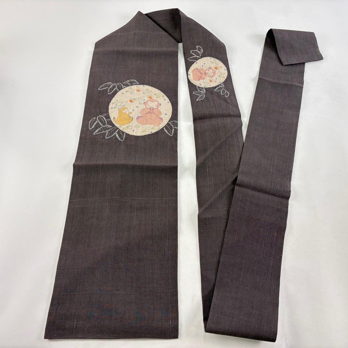 美品】 名古屋帯 逸品 紬地 猿 柿 金彩 絞り 茶紫 正絹｜中古・古着