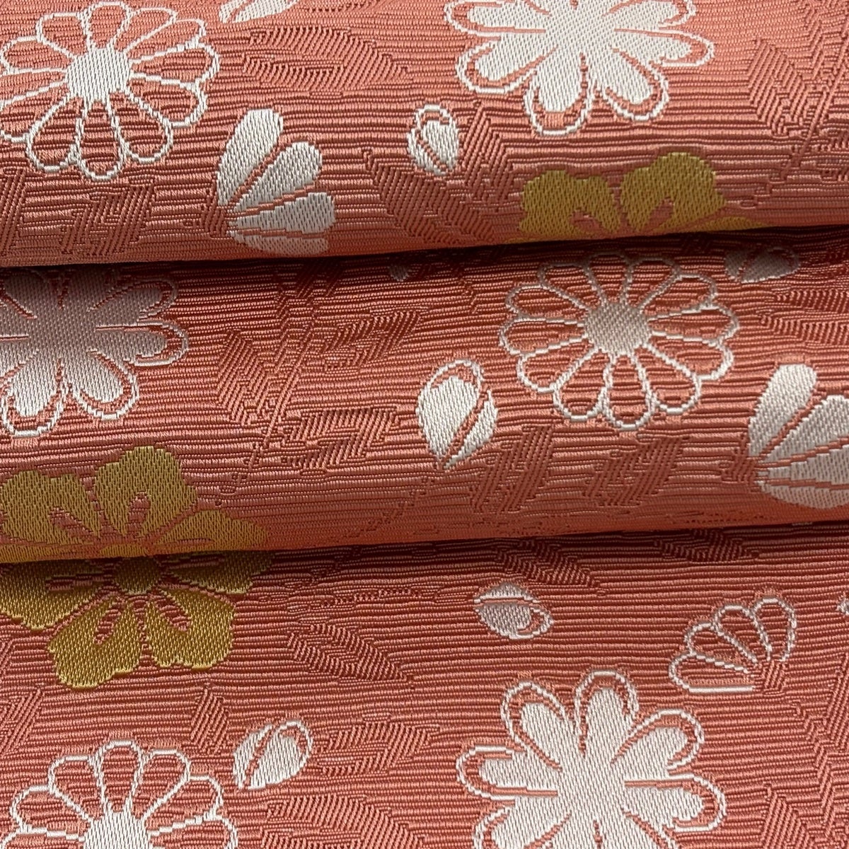 美品】半幅帯 優品 草花 薄オレンジ 化繊｜中古・古着・リサイクル着物