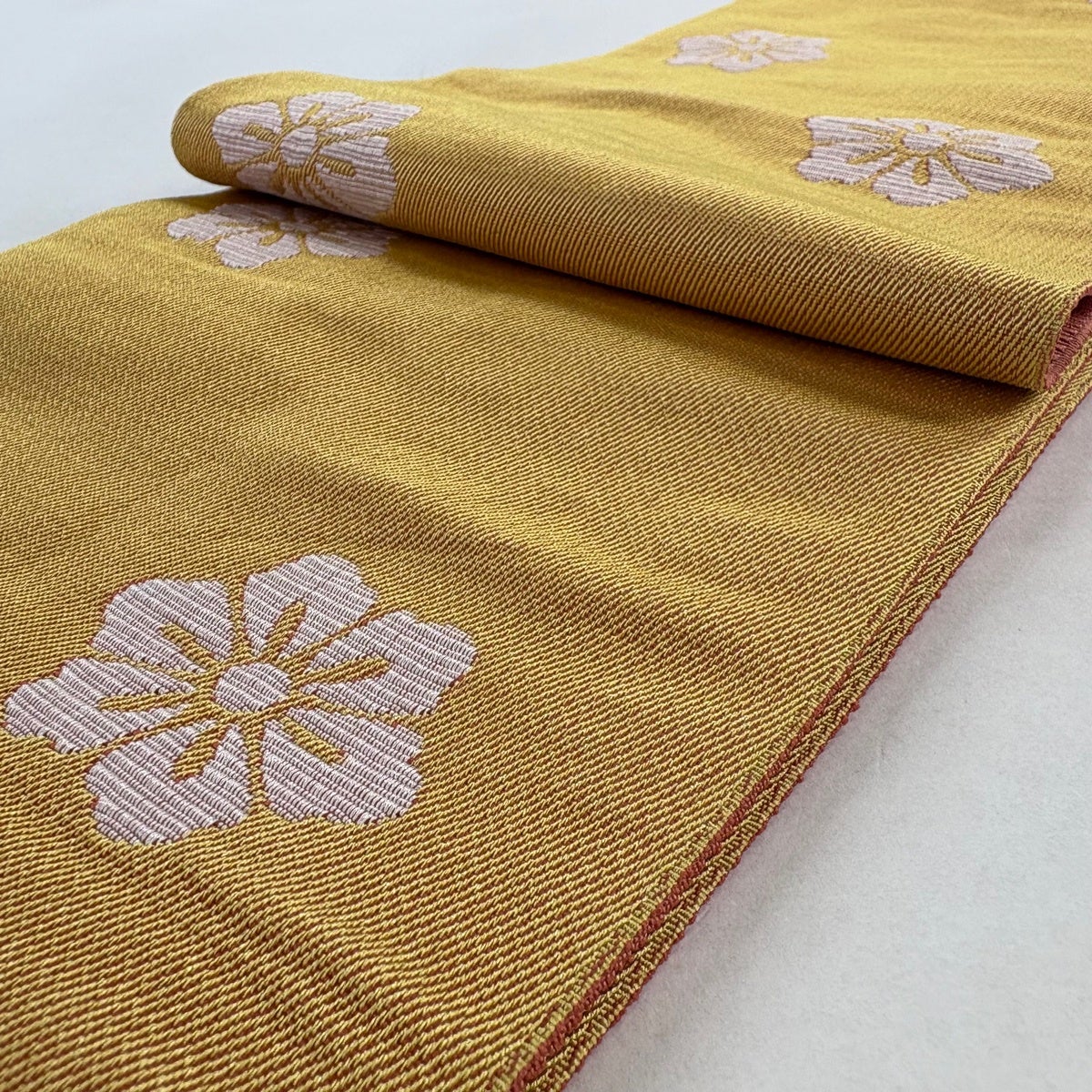 美品】半幅帯 優品 草花 薄オレンジ 化繊｜中古・古着・リサイクル着物