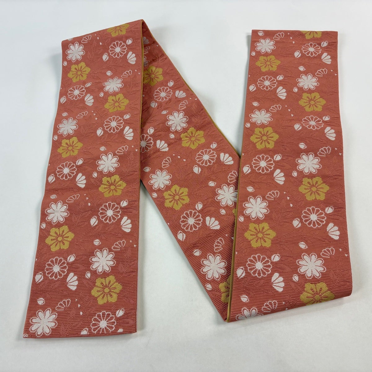 美品】半幅帯 優品 草花 薄オレンジ 化繊｜中古・古着・リサイクル着物