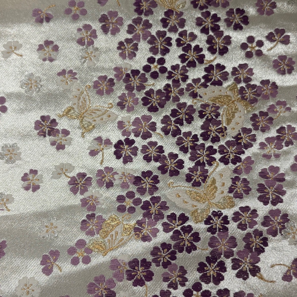 開き名古屋帯 名品 帝王紫 落款あり 関西仕立て 桜 蝶 箔 金銀糸 銀色