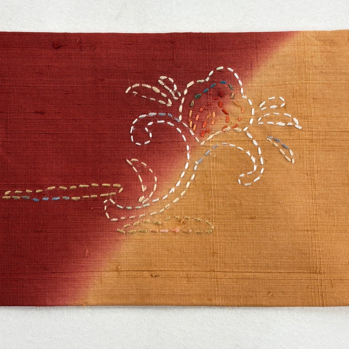 名古屋帯 秀品 紬地 草花 刺し子刺繍 薄オレンジ 正絹｜中古・古着