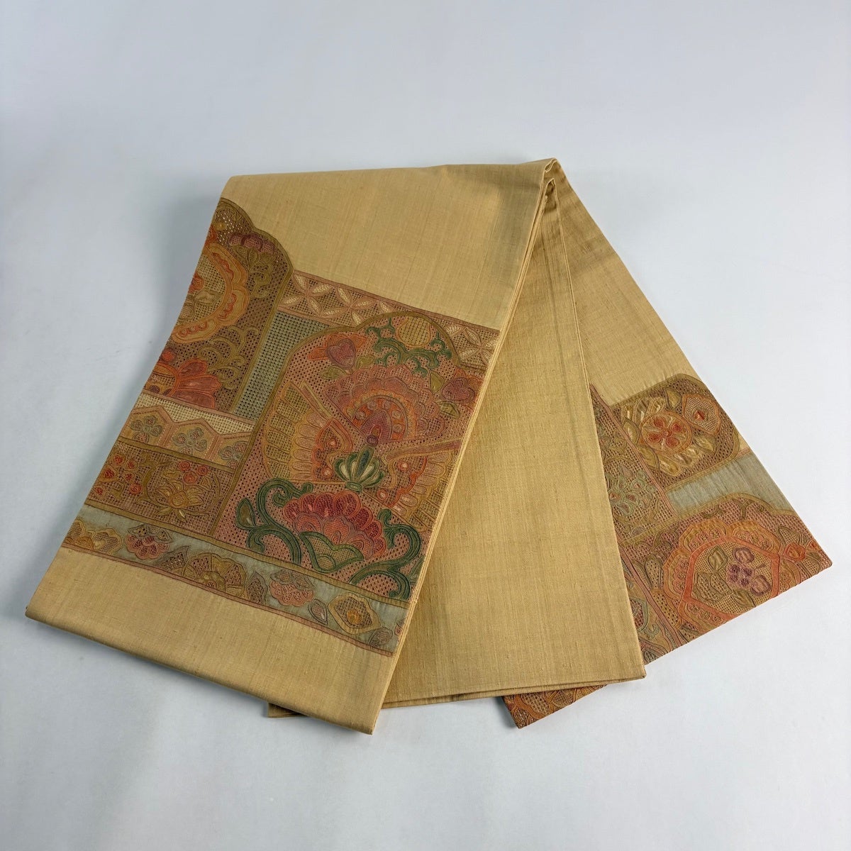 美品】 袋帯 名品 紬地 草花 七宝 刺繍 薄茶色 お太鼓柄 正絹｜中古
