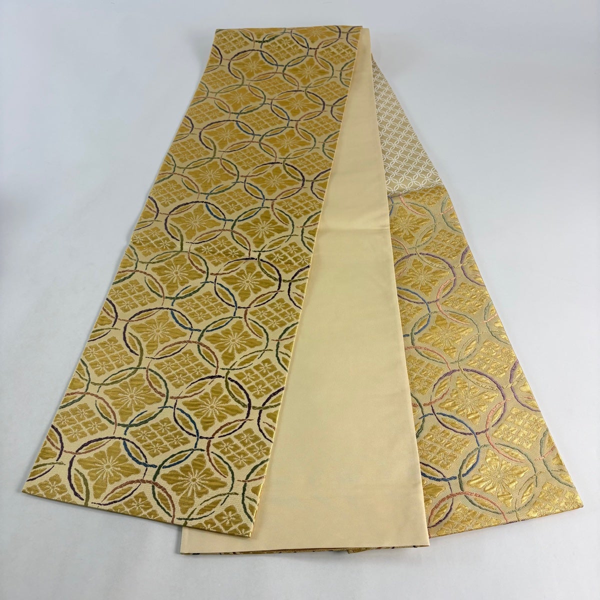 美品】 袋帯 名品 織匠十一代目 篠屋宗兵衛 ふくれおり 花菱 七宝 箔