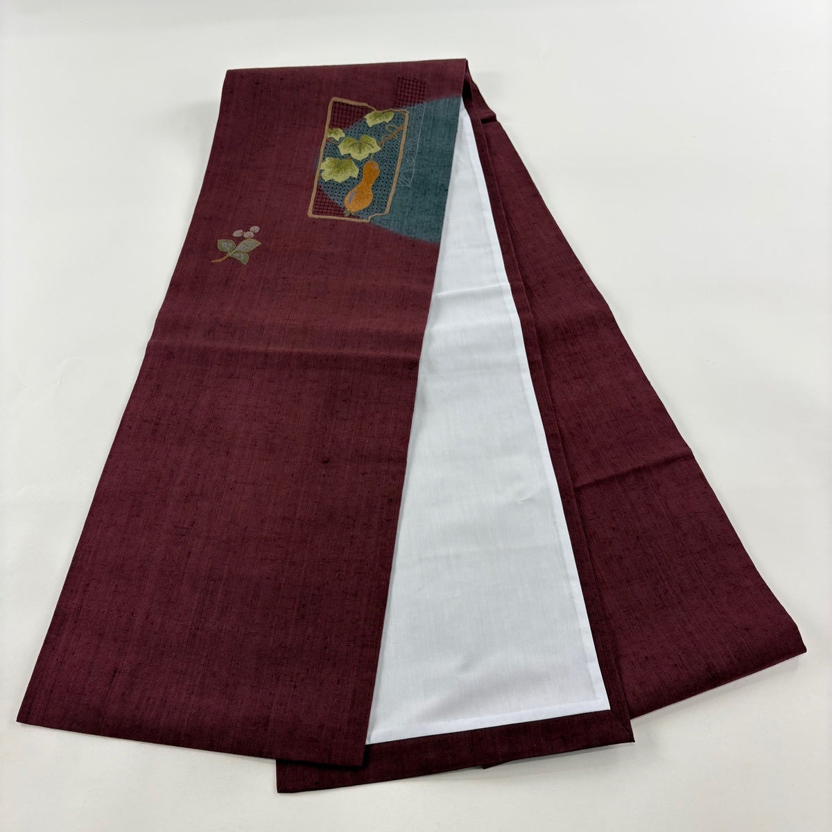 名古屋帯　渡文　新品　紫　緑　ブルー　茶　グレー　赤　葡萄唐草　紬　B200 帯のアトリエ花邑 hanamura 銀座店 「葡萄唐草文様 型染め 名古屋帯 」