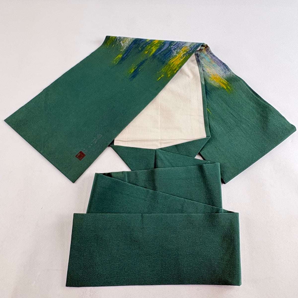 名古屋帯 名品 熊谷好博子 落款あり 幾何学 縮緬 緑 正絹｜中古・古着