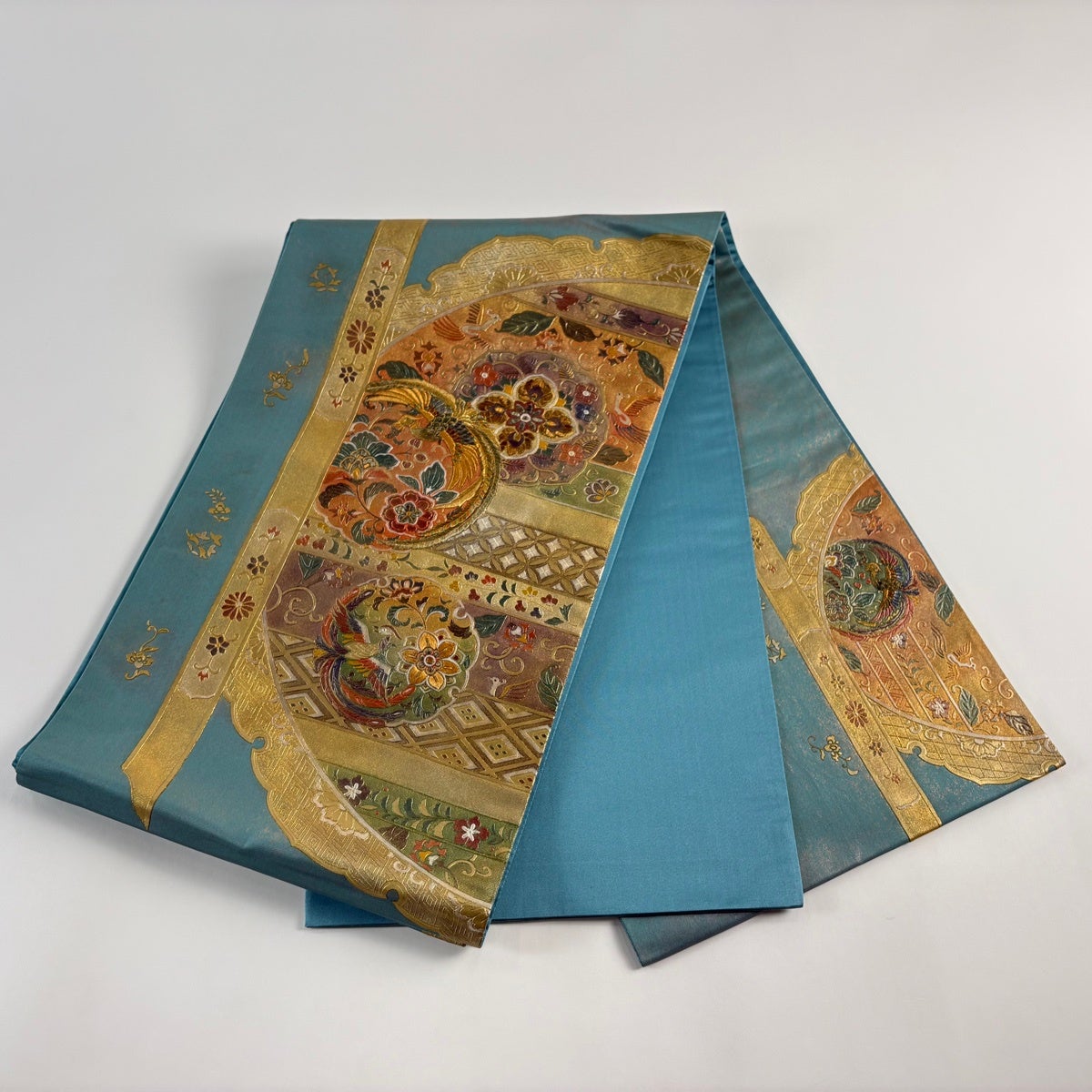 【美品】袋帯　螺鈿　甲斐泰造　青緑色　お太鼓柄　光沢キラキラ　締め跡あり 袋帯 螺鈿 甲斐泰造 甲斐周一郎 蒔絵染め 枝花の図 袋帯 御仕立上り