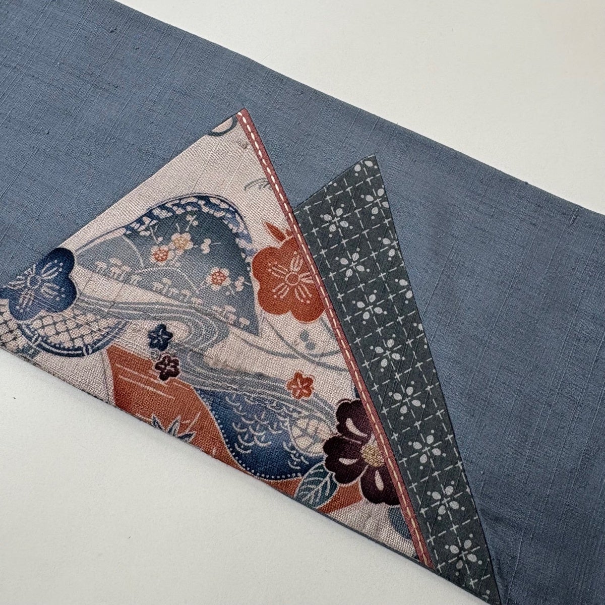 美品】 名古屋帯 秀品 草花 流水 紬地 切嵌め 青灰色 正絹｜中古・古着