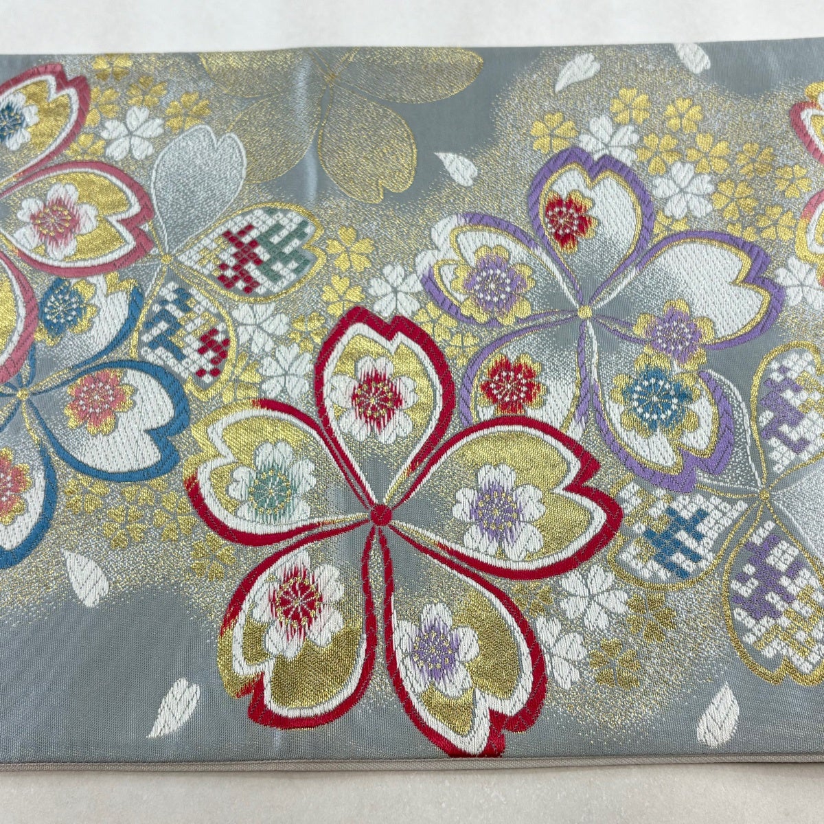 美品】 袋帯 秀品 振袖向き 桜 金糸 箔 水色 六通 正絹｜中古・古着