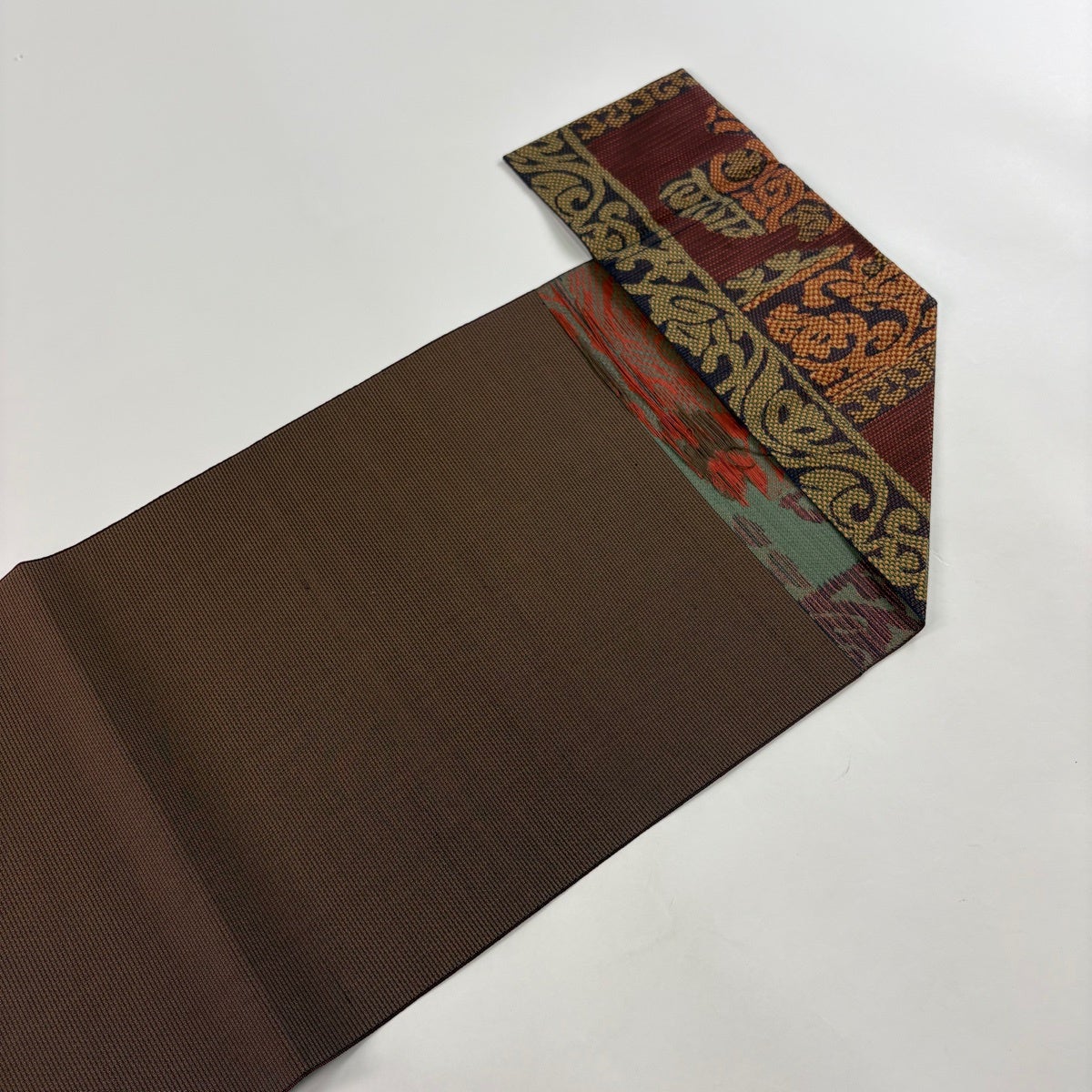 美品】 名古屋帯 優品 松葉仕立て 八寸名古屋帯 紬地 草花 花唐草 赤茶
