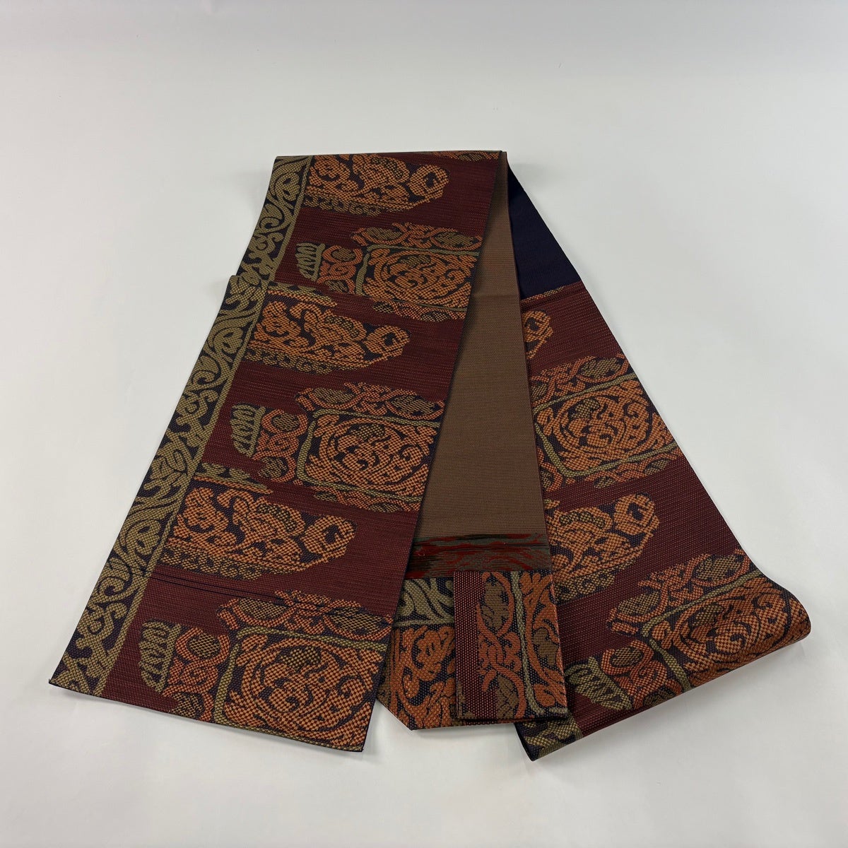 美品】 名古屋帯 優品 松葉仕立て 八寸名古屋帯 紬地 草花 花唐草 赤茶